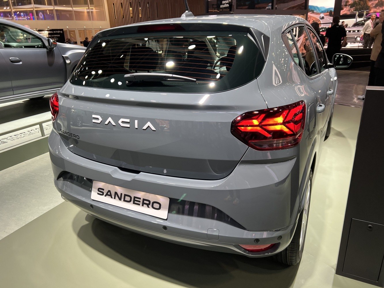 Rear view of a hatchback with modern angular LED taillights and bold rear lettering.