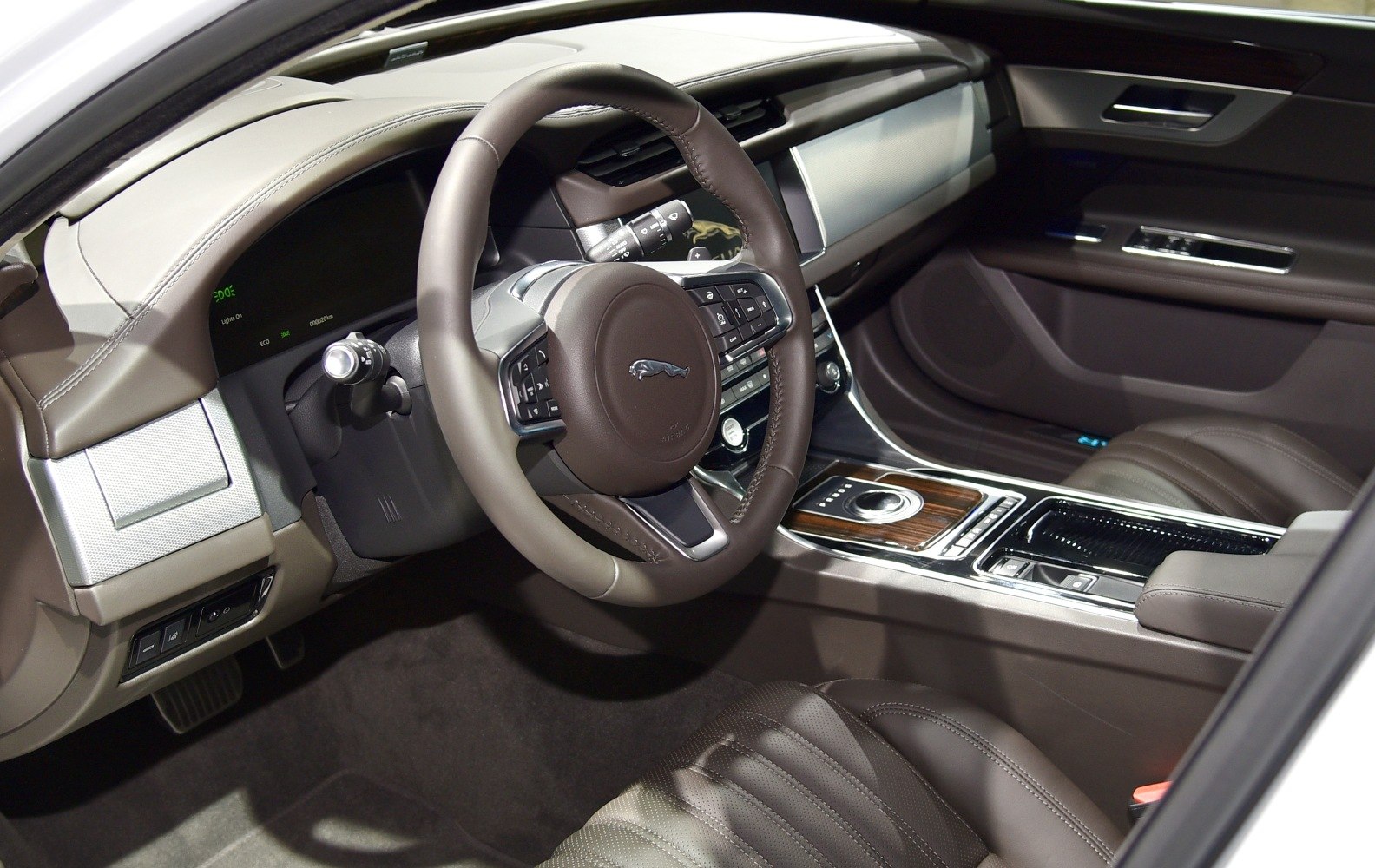 Leather steering wheel and modern dashboard with center console