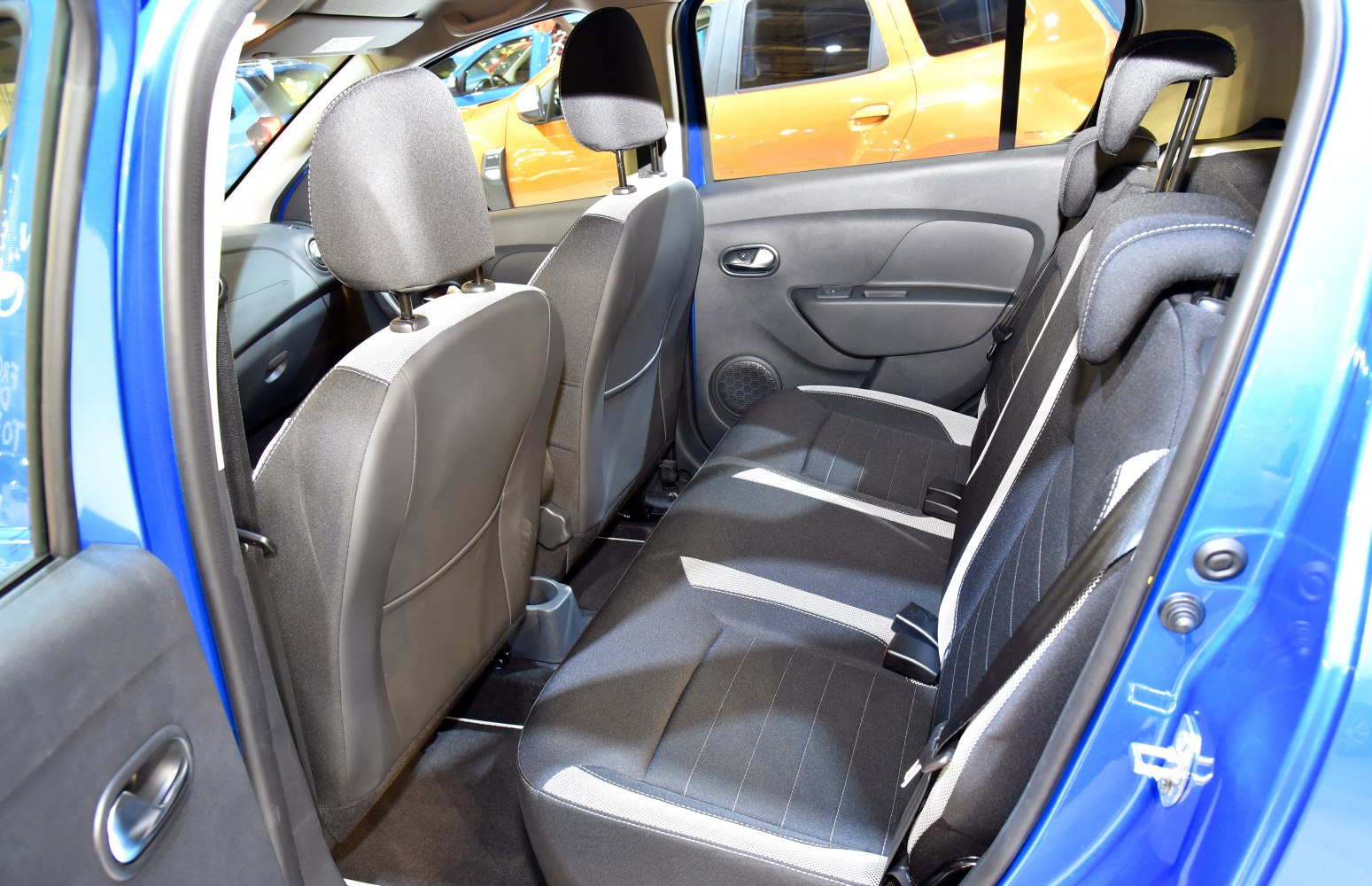 Rear seat interior with cloth upholstery and headrests
