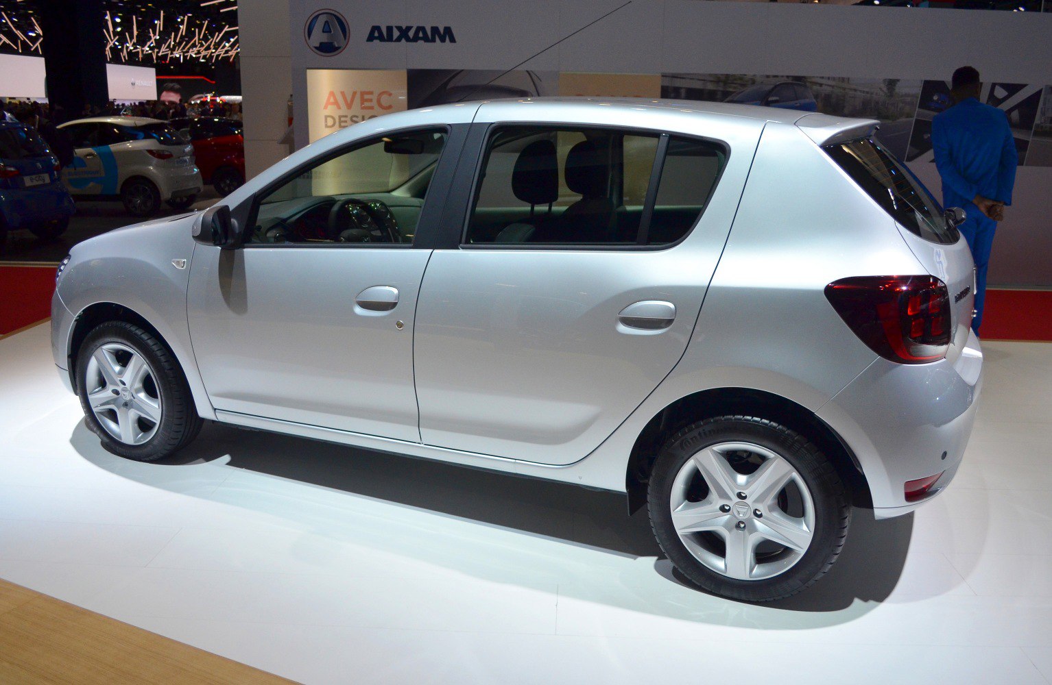 Silver compact 5-door hatchback side profile with alloy wheels