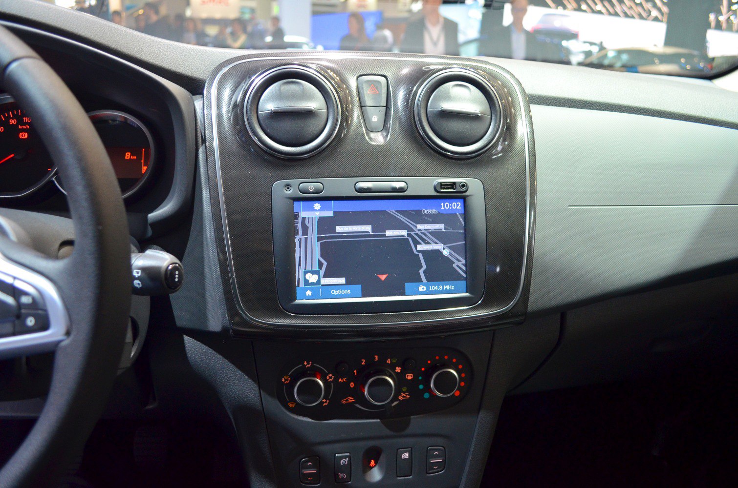 Dashboard central console with touchscreen and manual climate controls