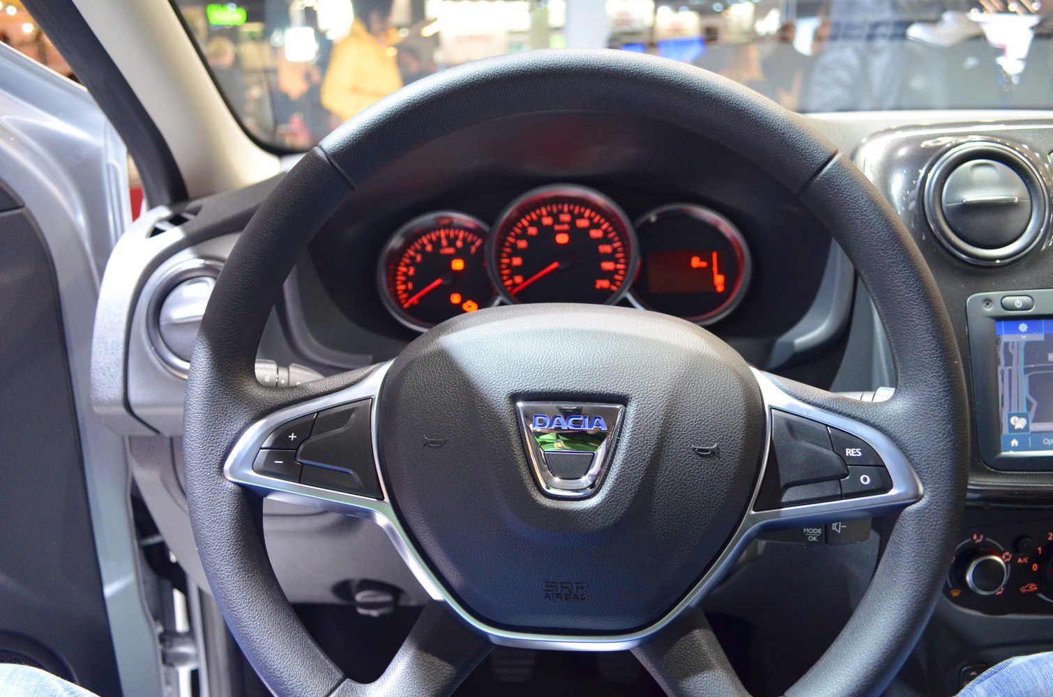 Steering wheel with controls and illuminated instrument cluster