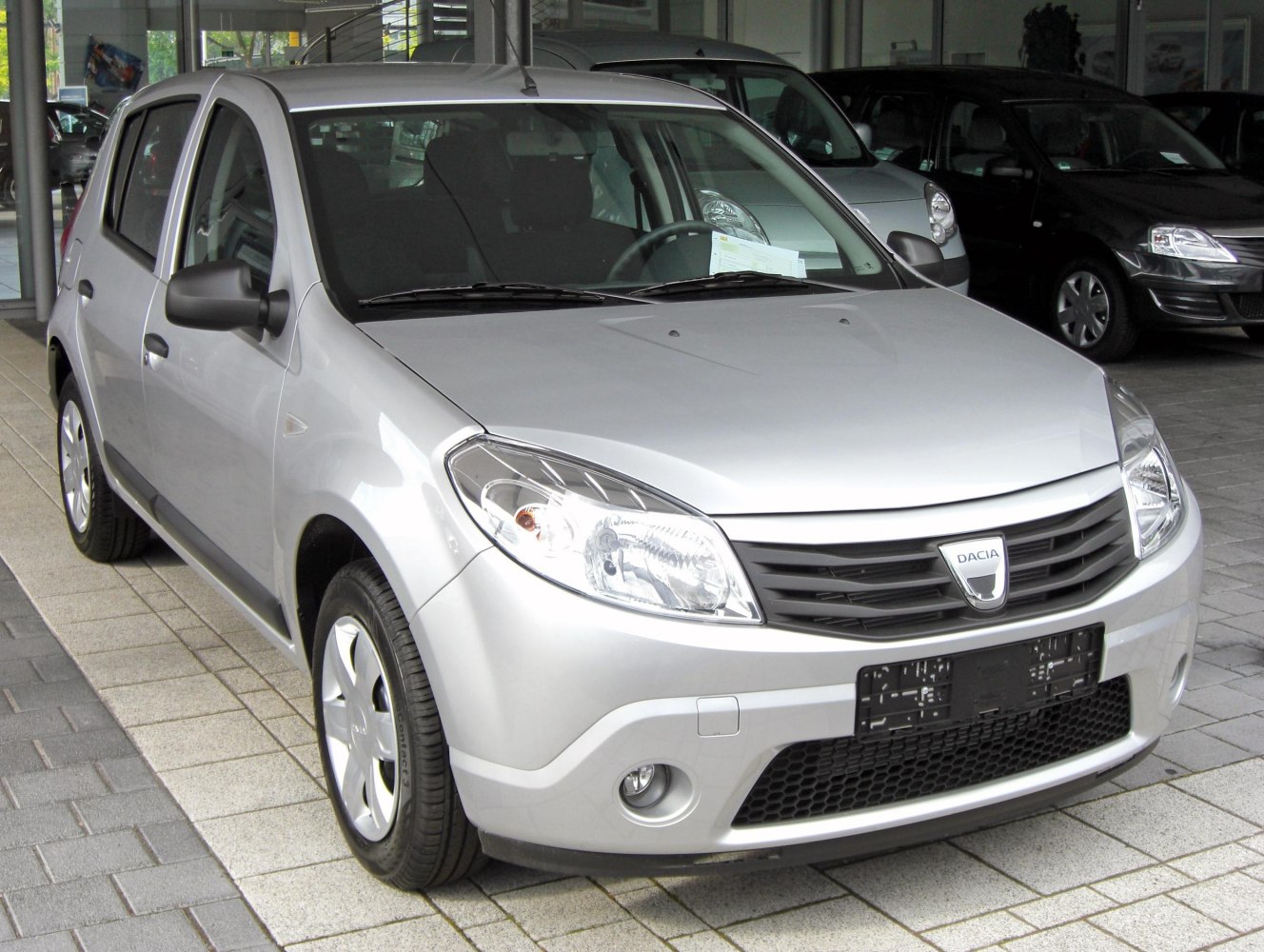 Front view of silver compact five-door hatchback with prominent headlights