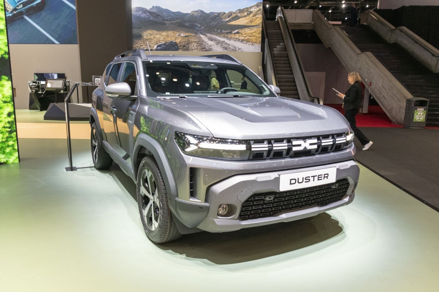 Front view of a modern SUV with LED headlights and bold grille
