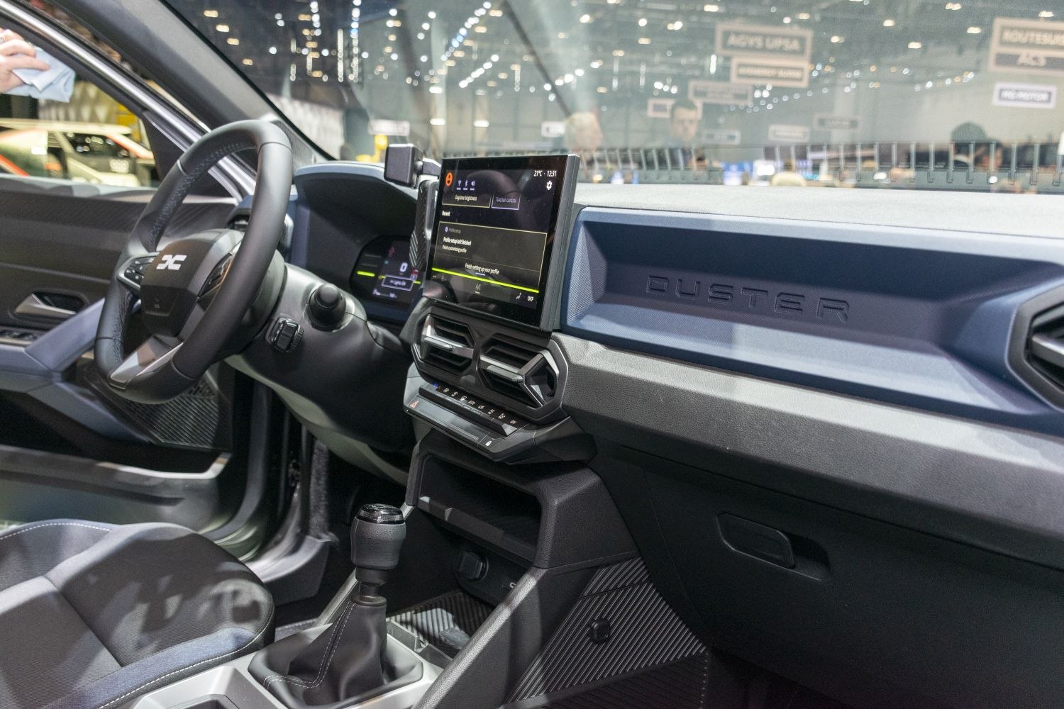 Modern dashboard with touchscreen and manual gear lever