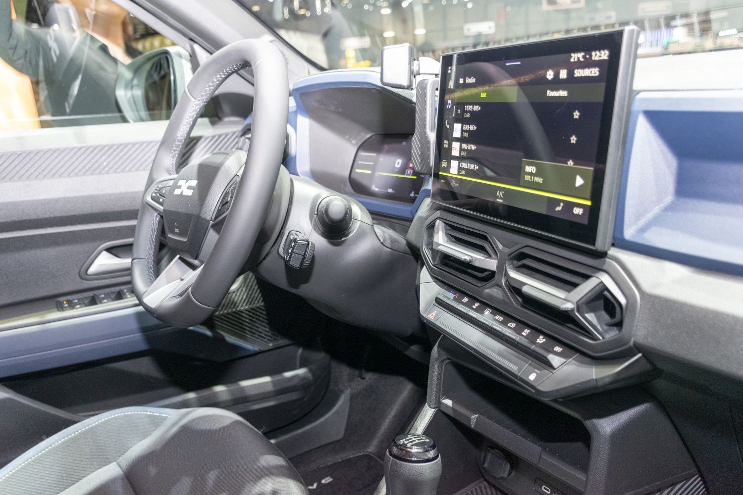 Digital dashboard and touchscreen infotainment system in modern car interior