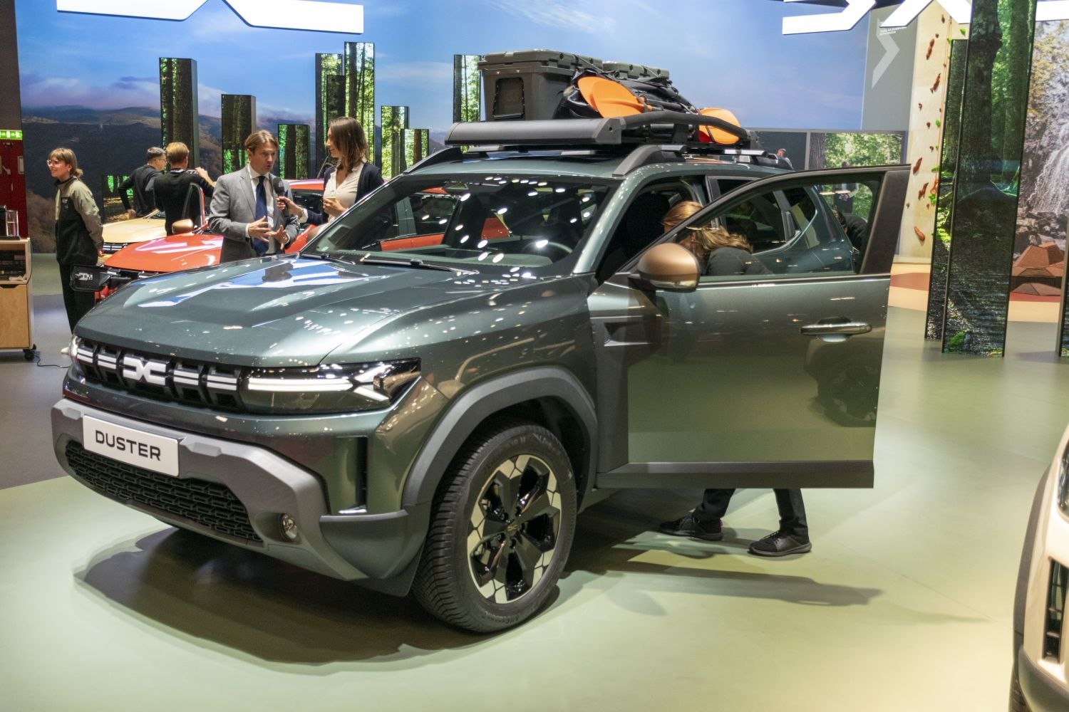 Rugged SUV with roof rack and off-road gear