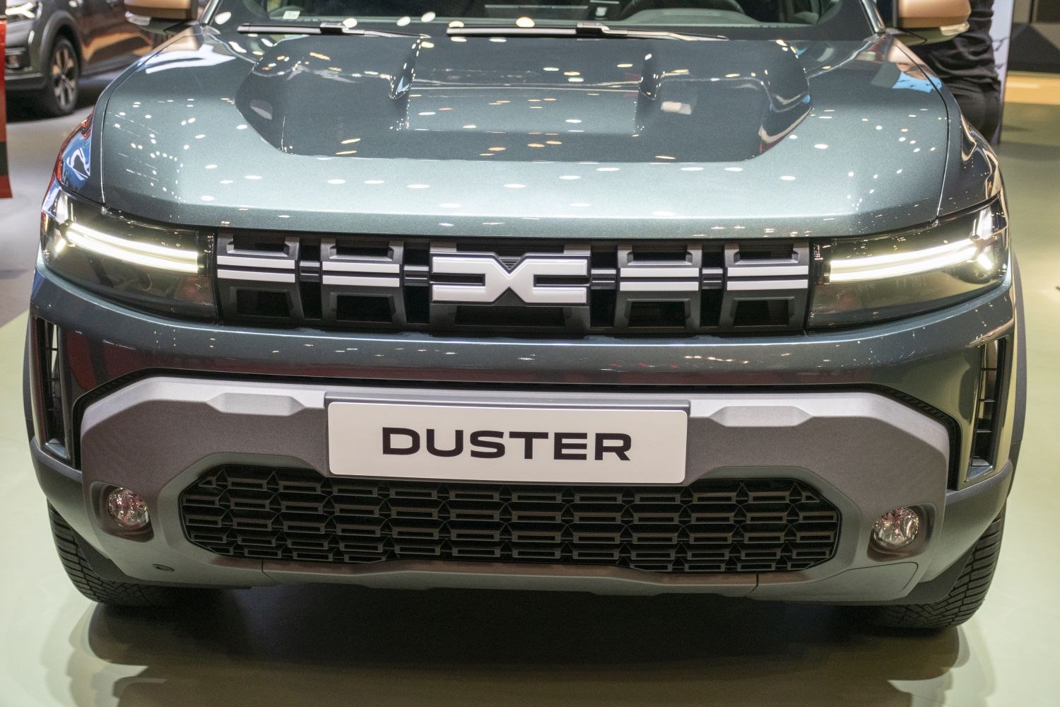 Bold front grille and distinctive LED headlights of a modern SUV