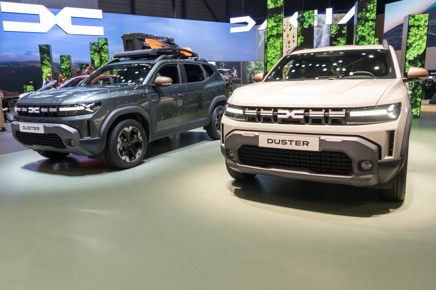 Front view of 2024 SUV featuring grille, LED headlights, and roof rack with cargo.