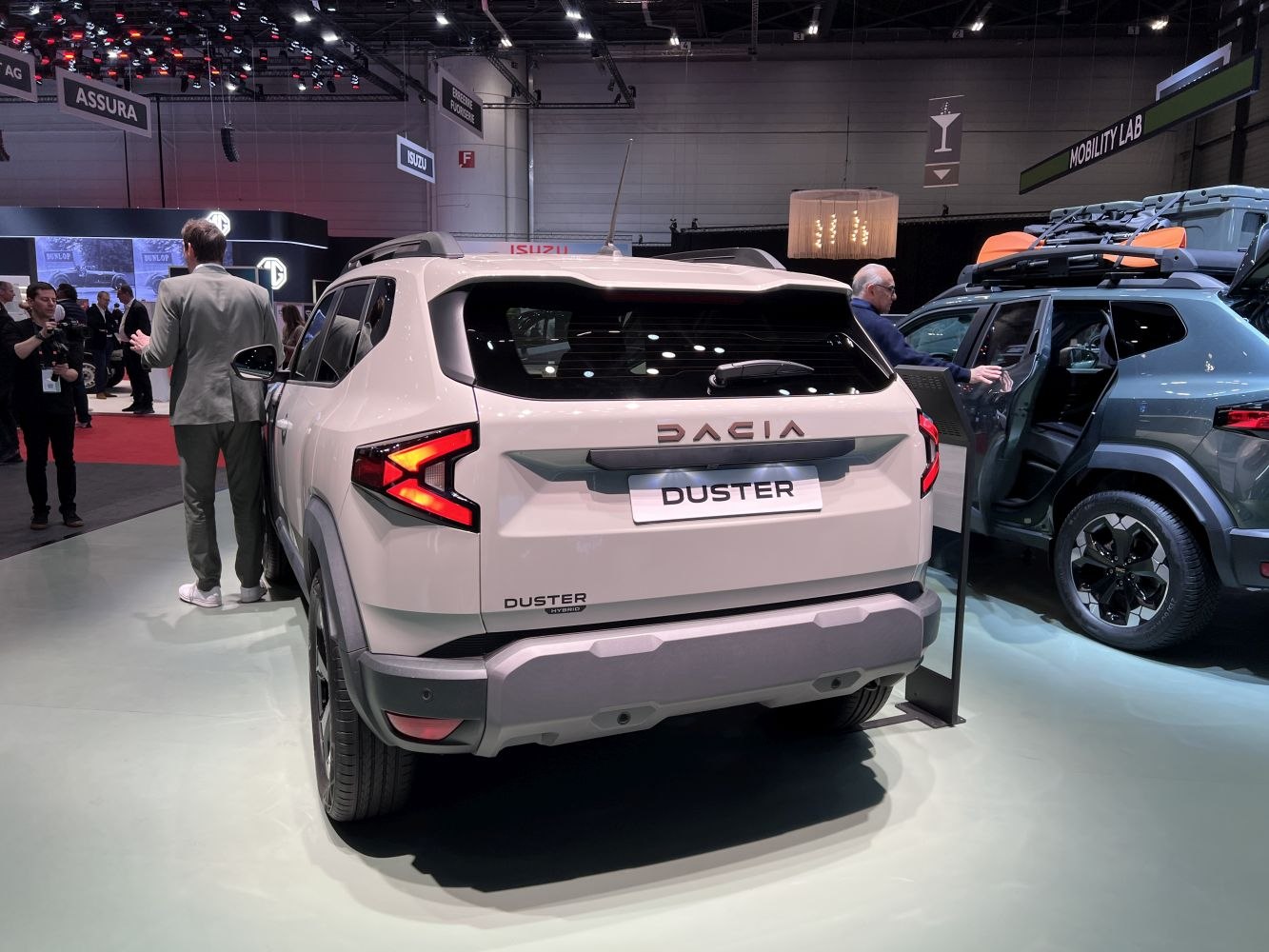 Rear view of SUV with hybrid badge and distinctive taillights