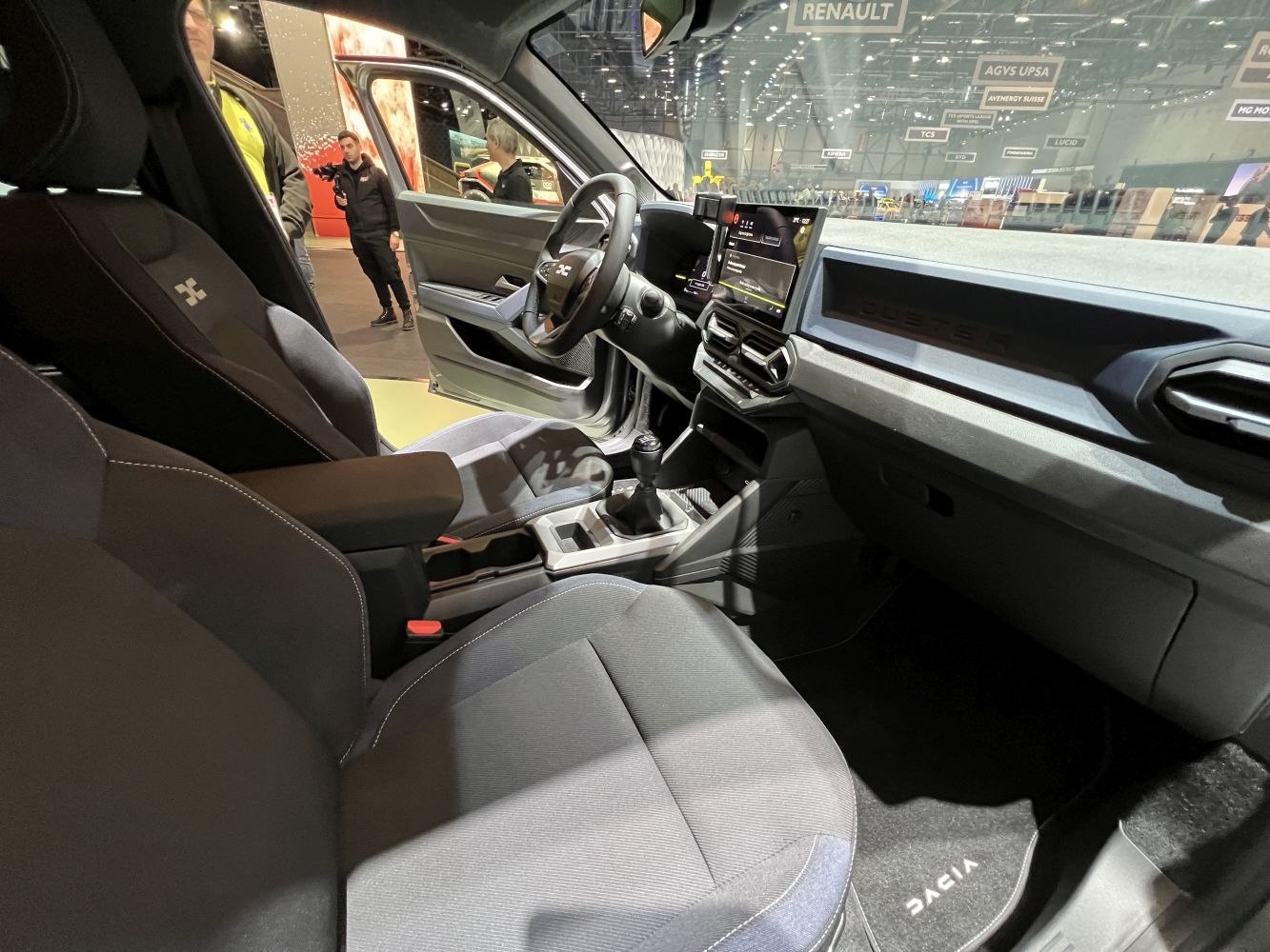 Modern dashboard and manual gear lever in car interior