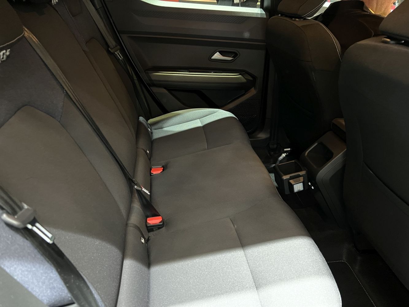 Spacious rear seat interior with modern door panel