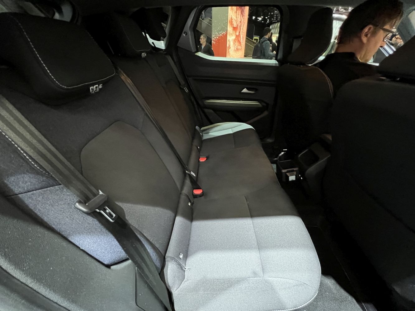 Rear seats with modern upholstery and spacious interior.
