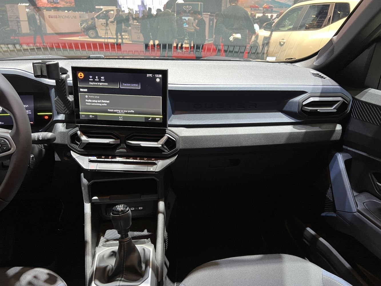 Modern dashboard with touchscreen and manual gear shift