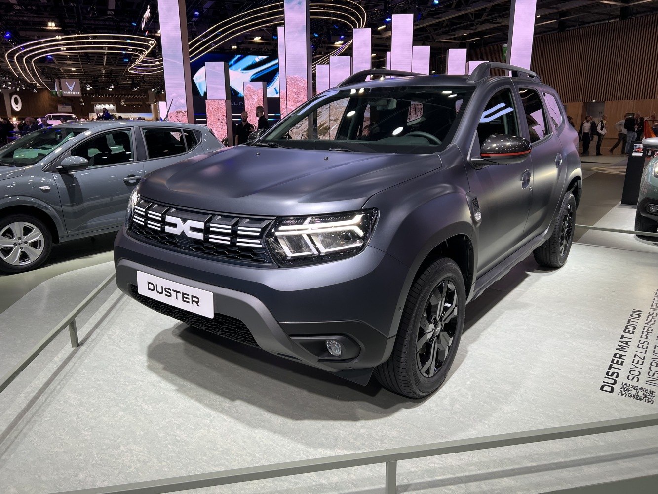 Front view with LED headlights and bold grille of a modern SUV