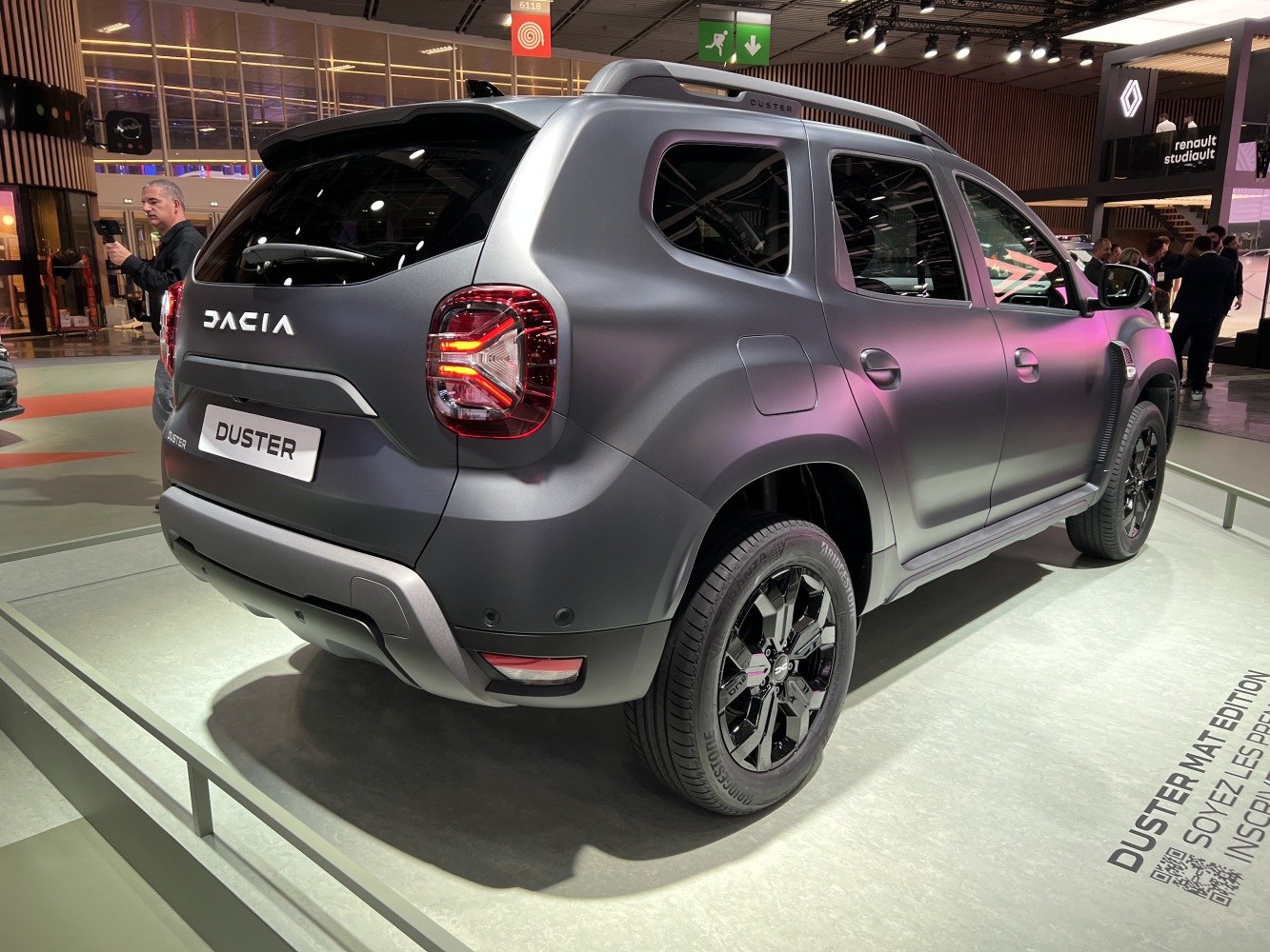 Rear view of SUV with matte finish and black alloy wheels