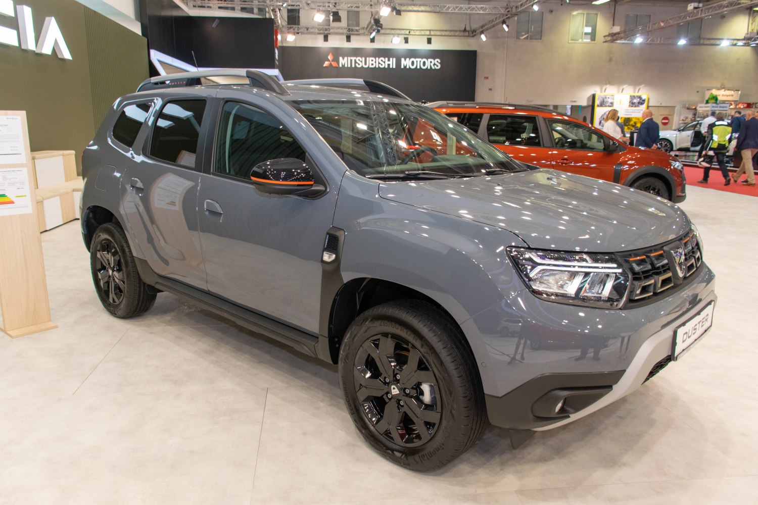Front and side view of gray SUV with LED headlamps and black alloy wheels