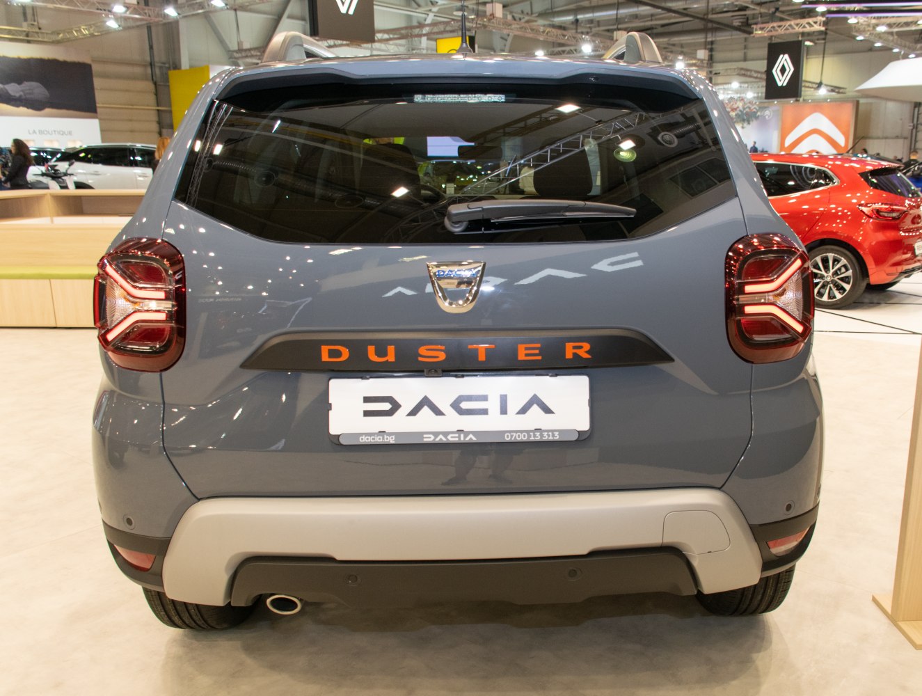 Rear view with distinctive taillights and exhaust pipe
