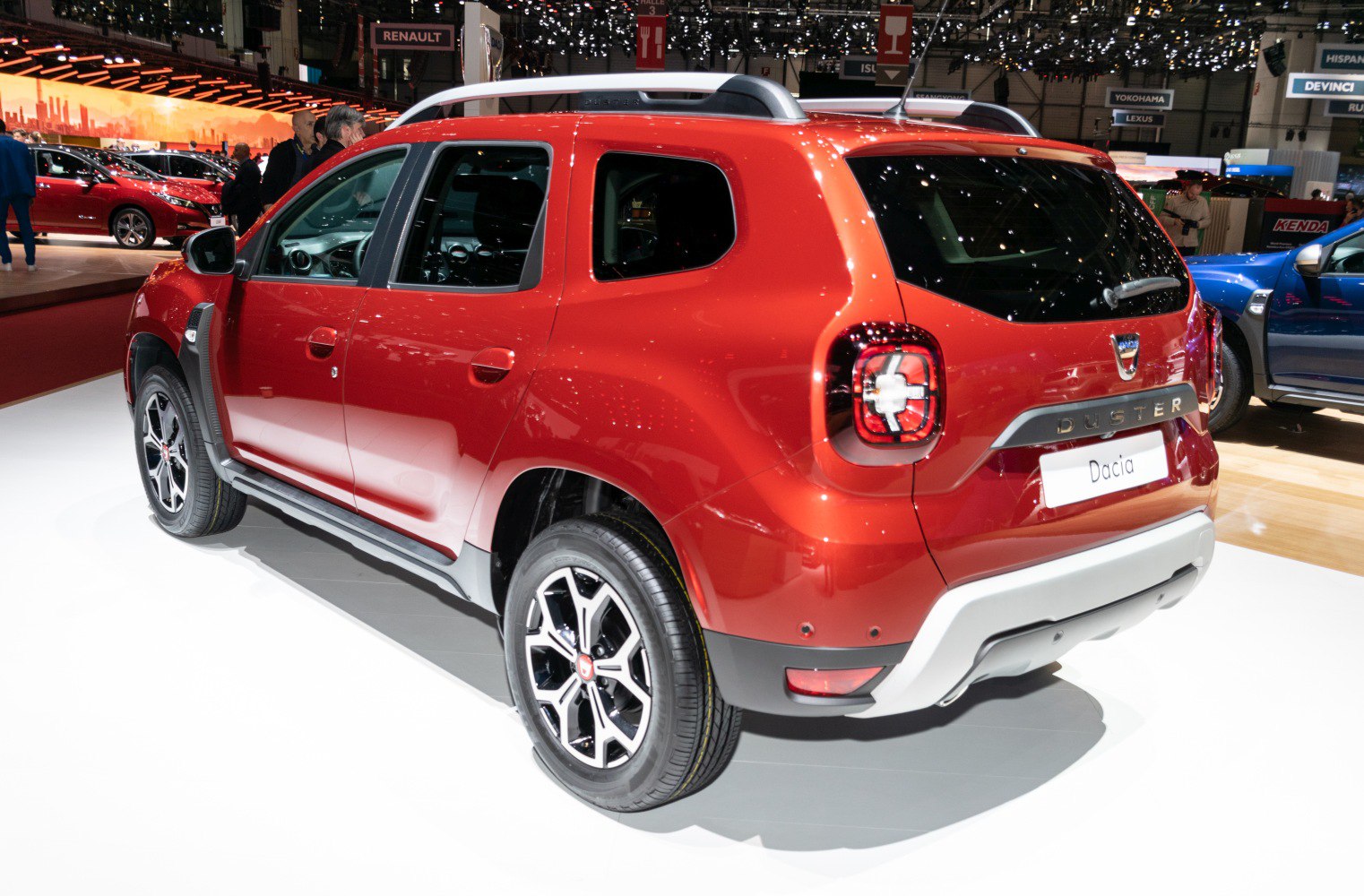Rear side view showcasing unique square tail lights and alloy wheels.