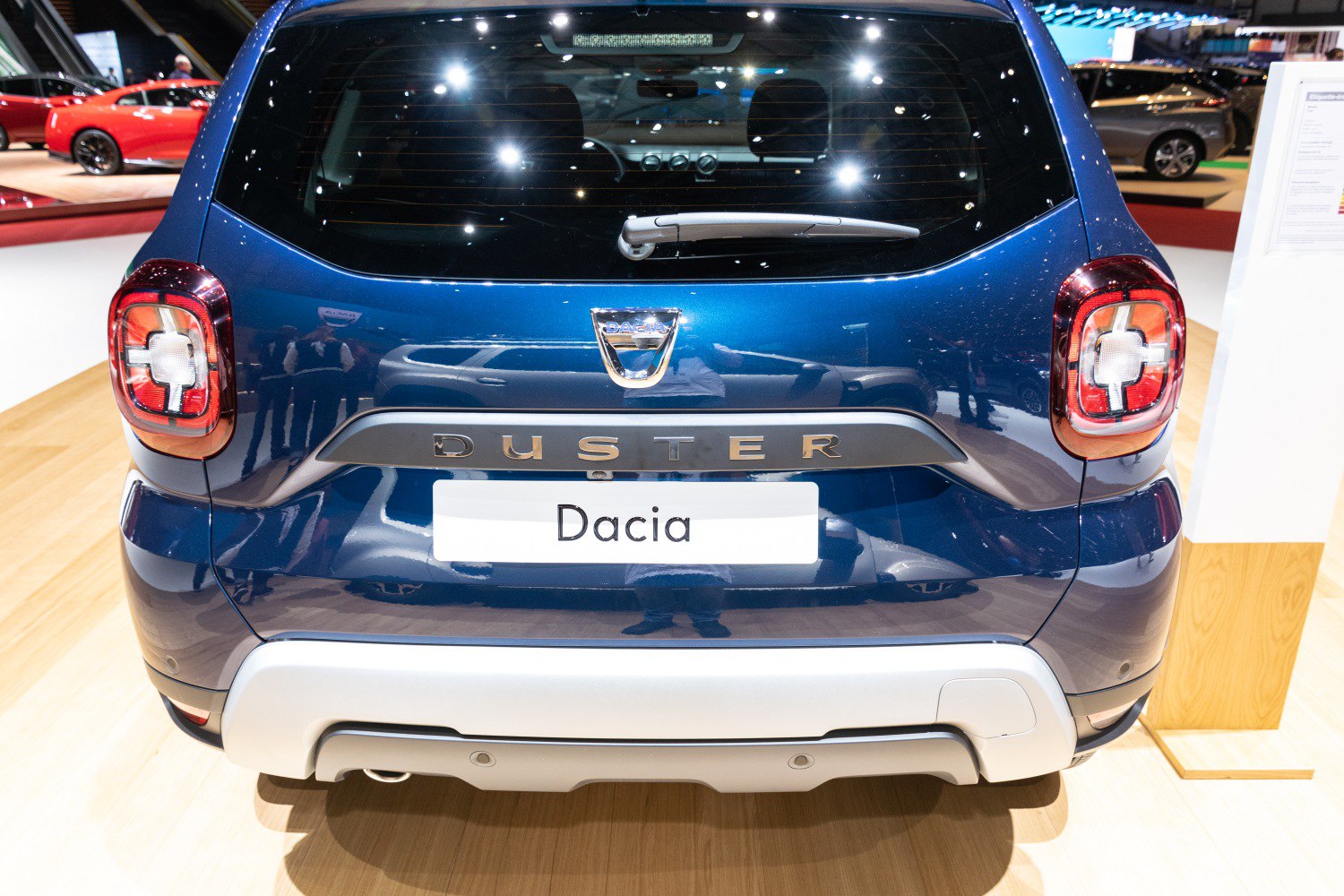 Rear view of SUV with distinctive taillights and rear windshield wiper