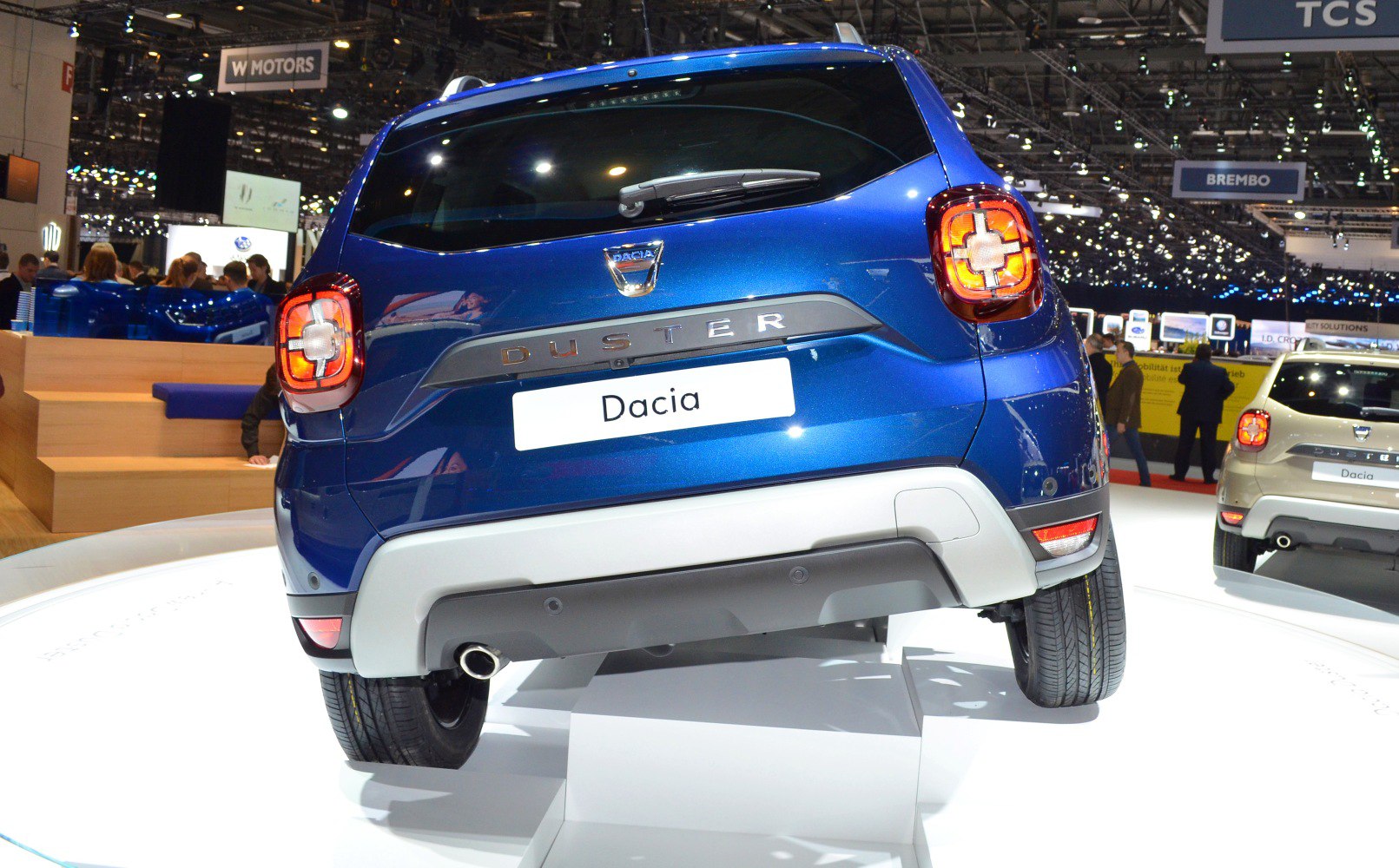 Rear view showing distinct tail lights and rear bumper of an SUV.