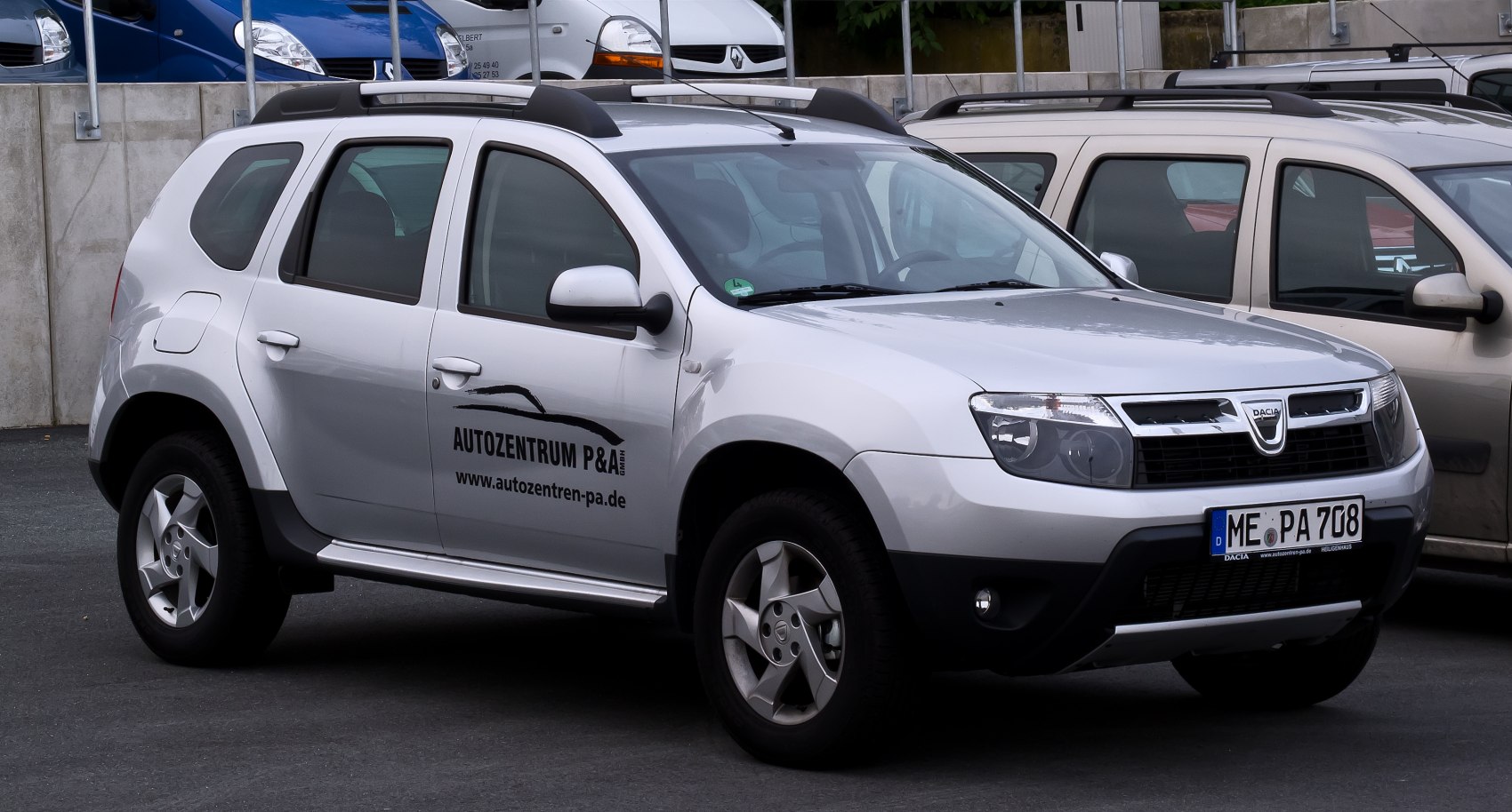 Silver SUV with distinctive front grille and side profile