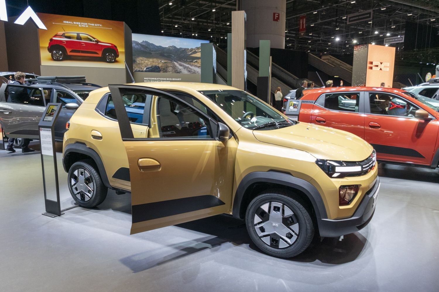 Compact electric SUV with modern LED headlights and unique wheel design.