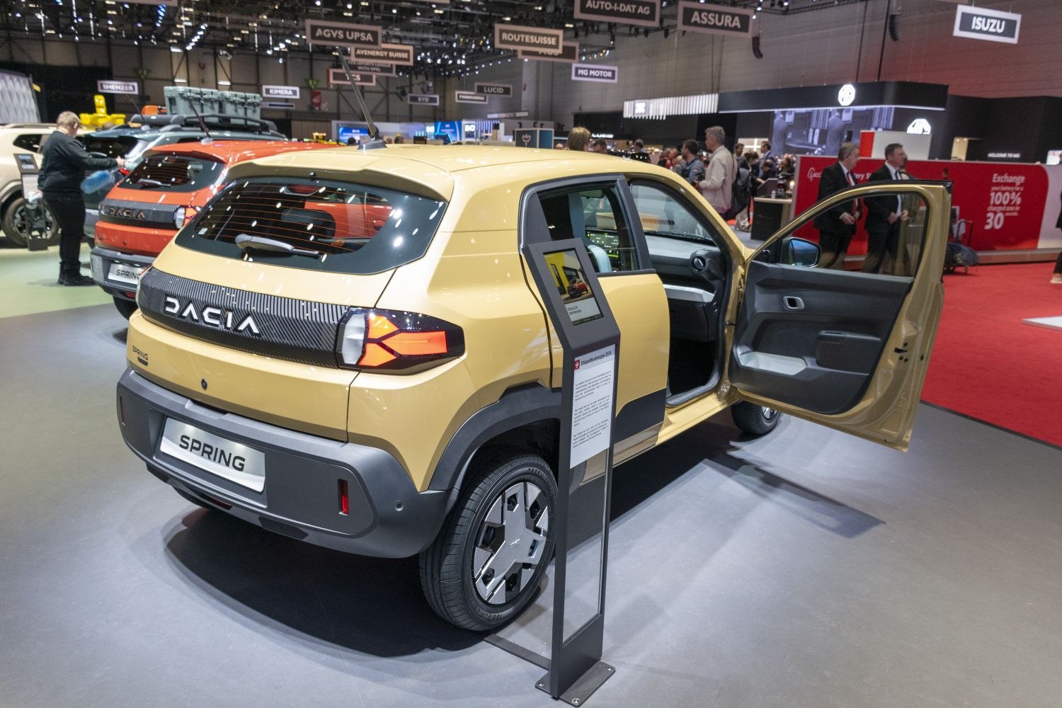 Rear view and open door interior of a compact electric hatchback