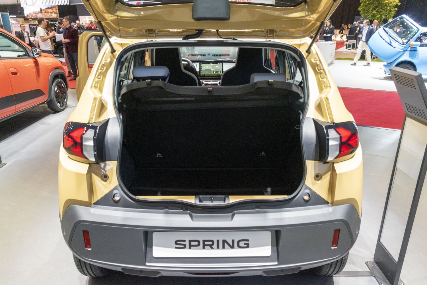 Open rear hatch with spacious trunk and modern tail lights.