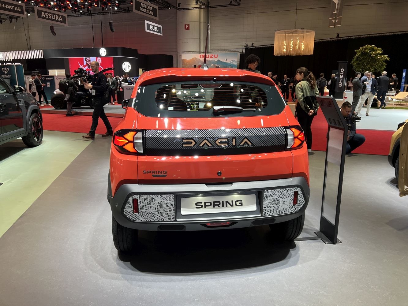 Rear view of compact electric hatchback with LED taillights and bold branding