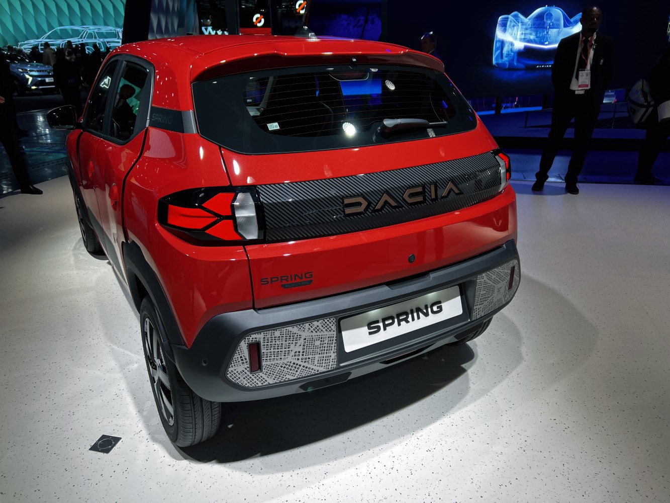 Redesigned rear with distinct taillights and textured bumper panels
