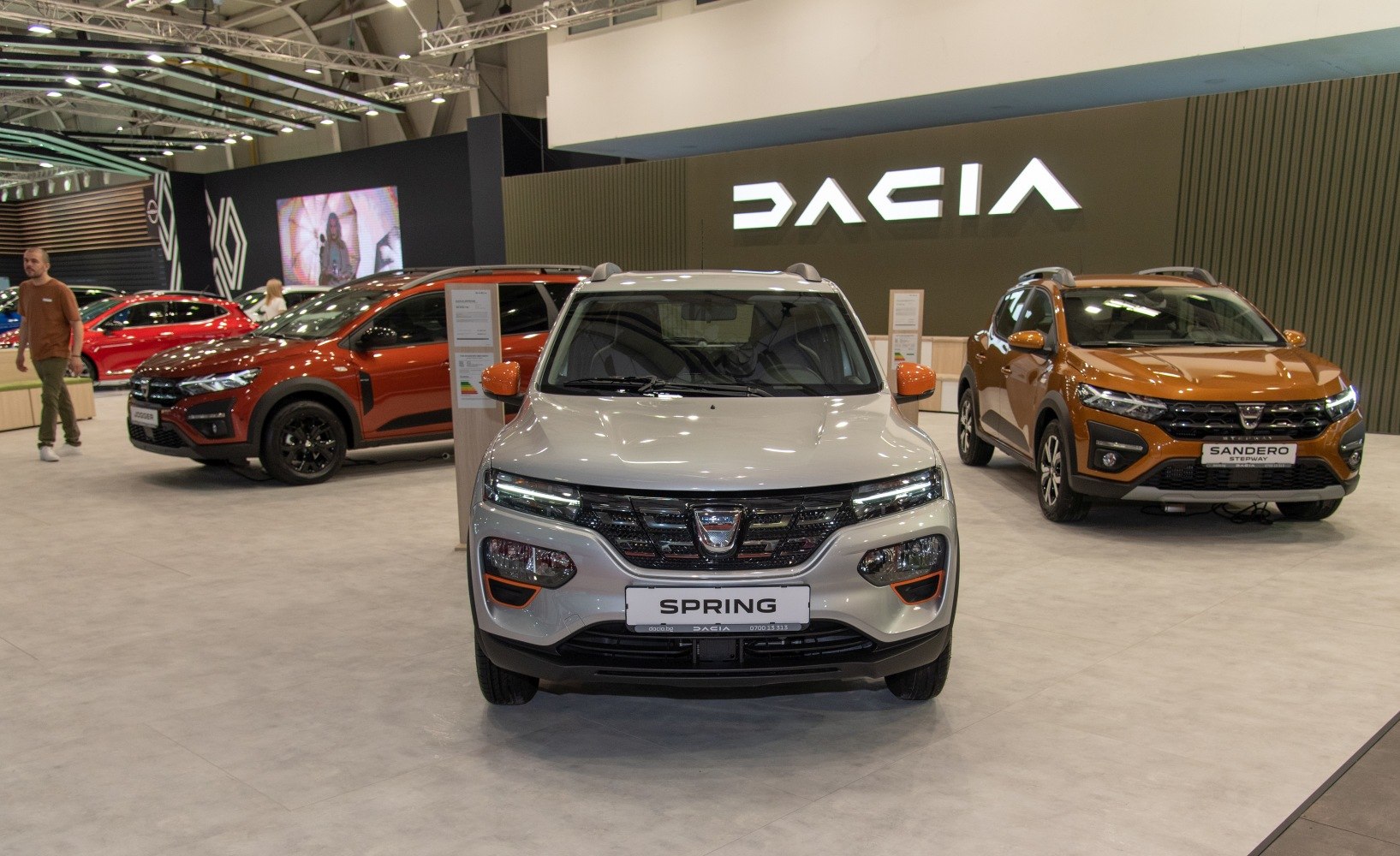 Front view of compact SUV with distinctive headlights and grille