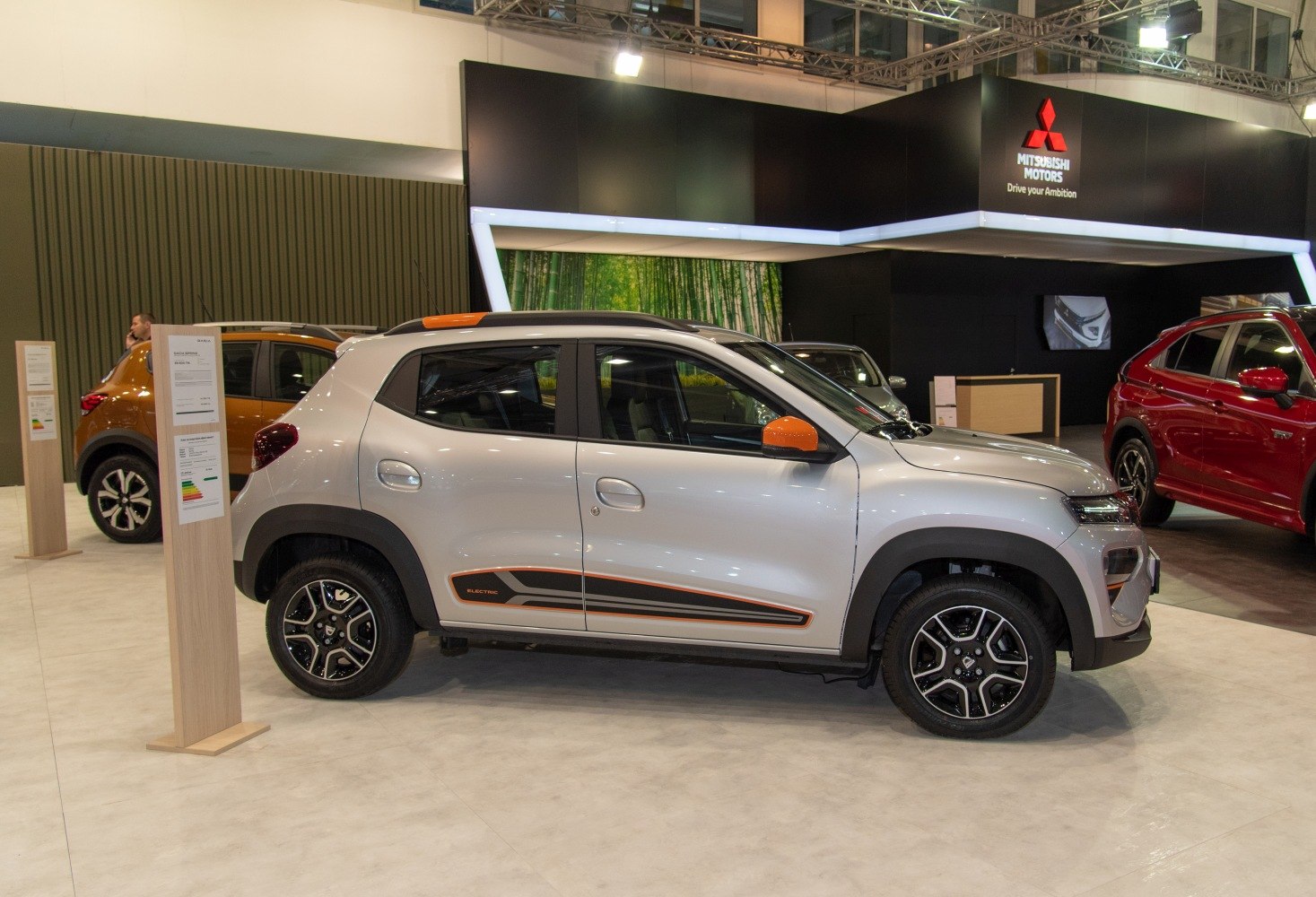 Electric subcompact SUV with orange mirrors and sporty alloy wheels