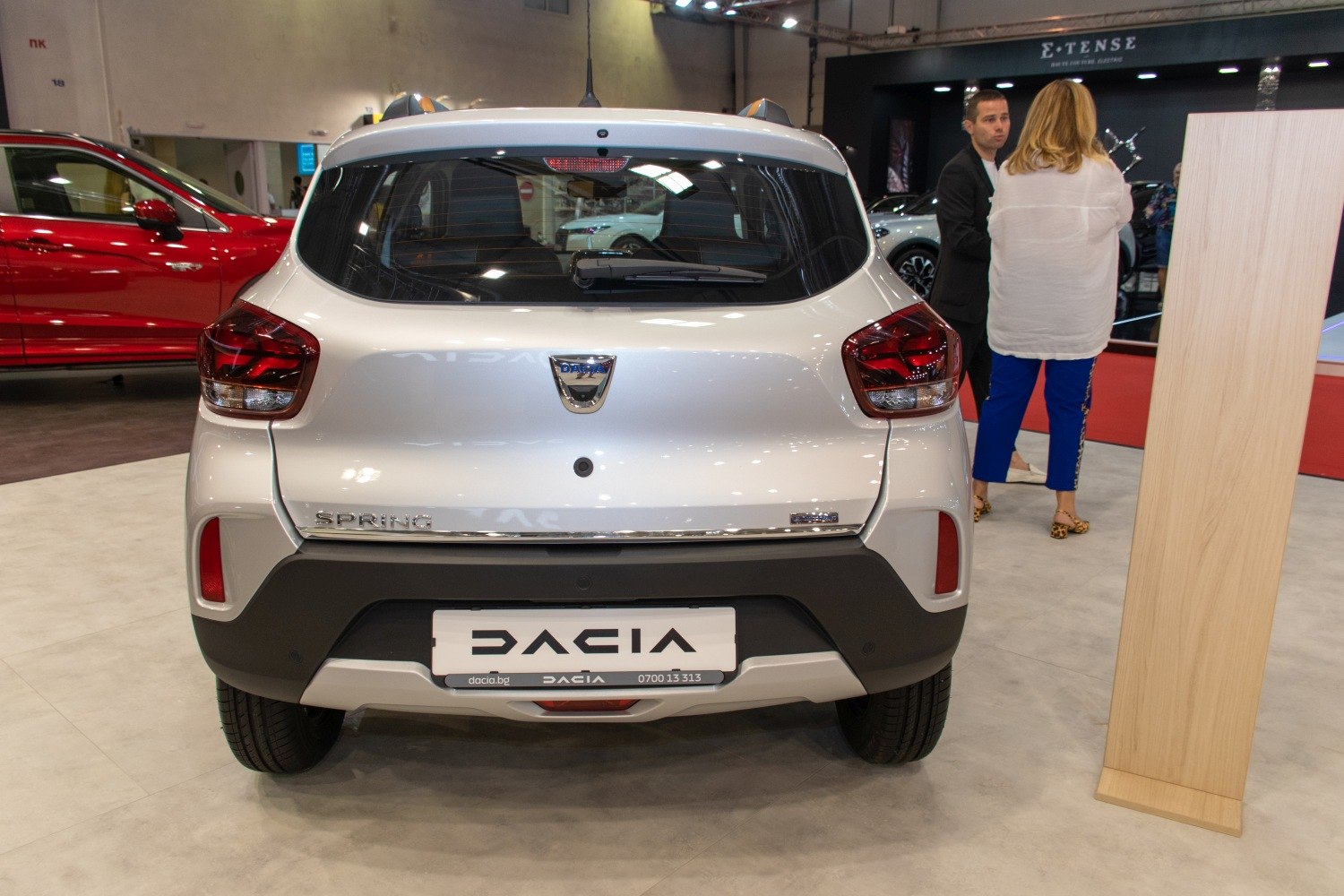 Rear view of a compact hatchback with distinctive taillights and rear windshield wiper