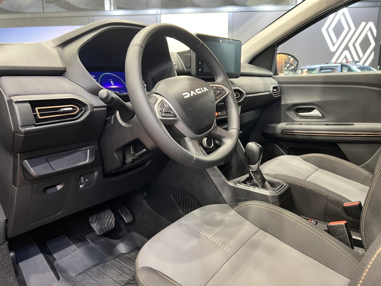 Digital instrument cluster and touchscreen infotainment with manual gear shift