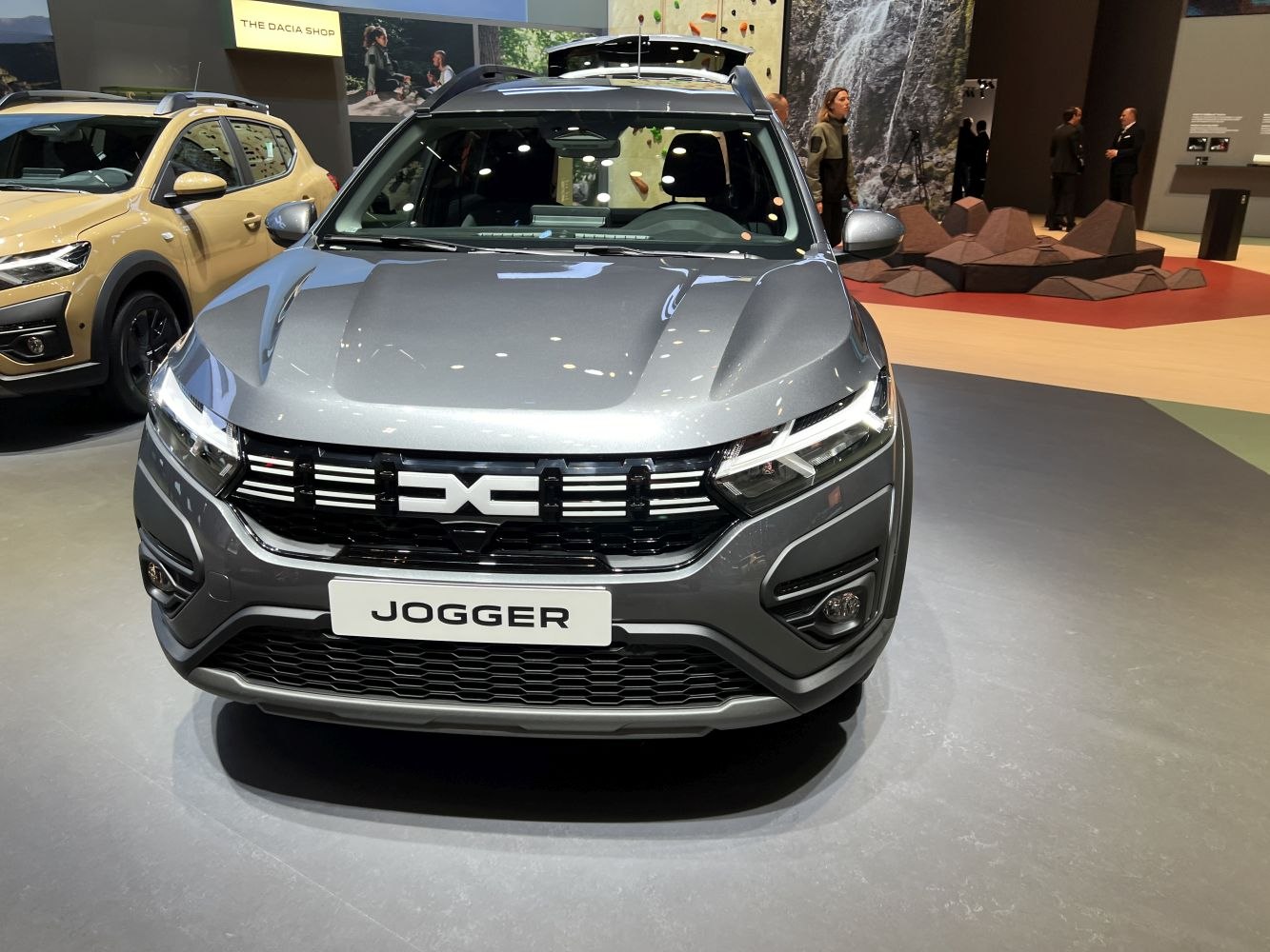 Front view featuring grille and LED headlights.