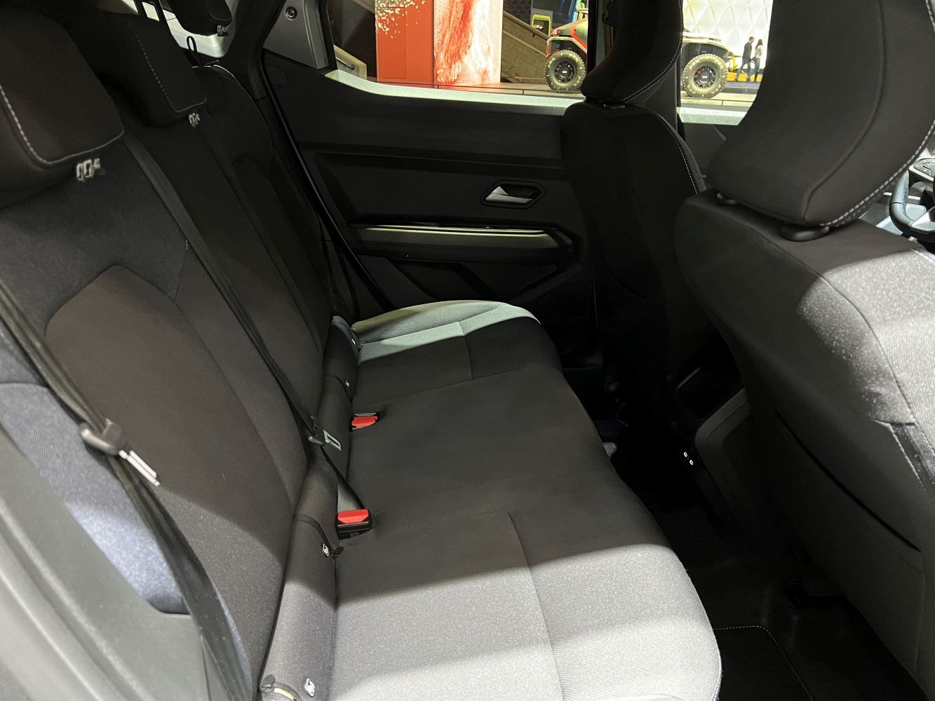 Spacious and comfortable rear seats with fabric upholstery