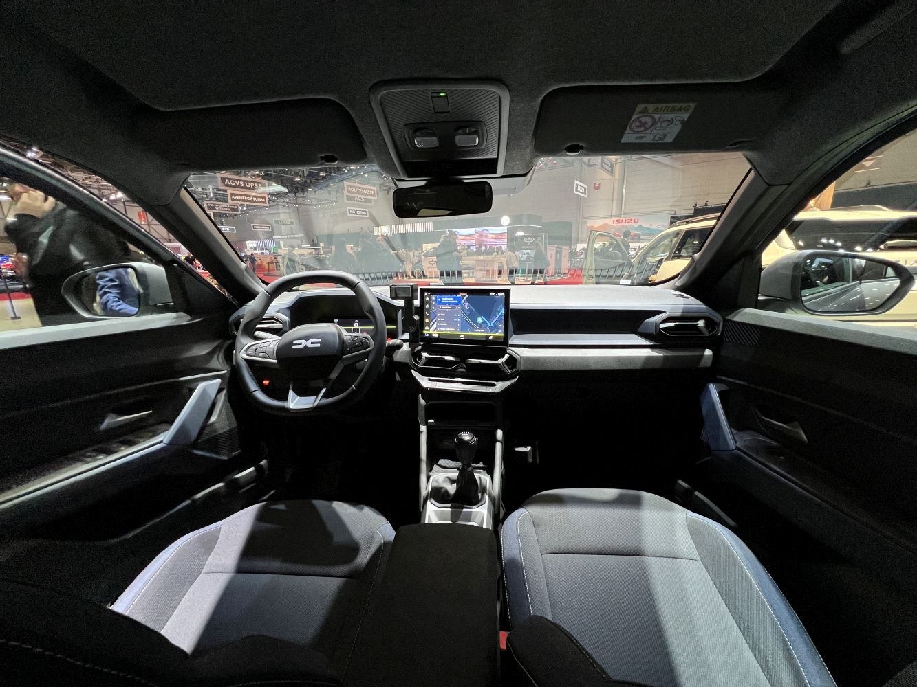 Modern car interior with digital dashboard and multifunction steering wheel