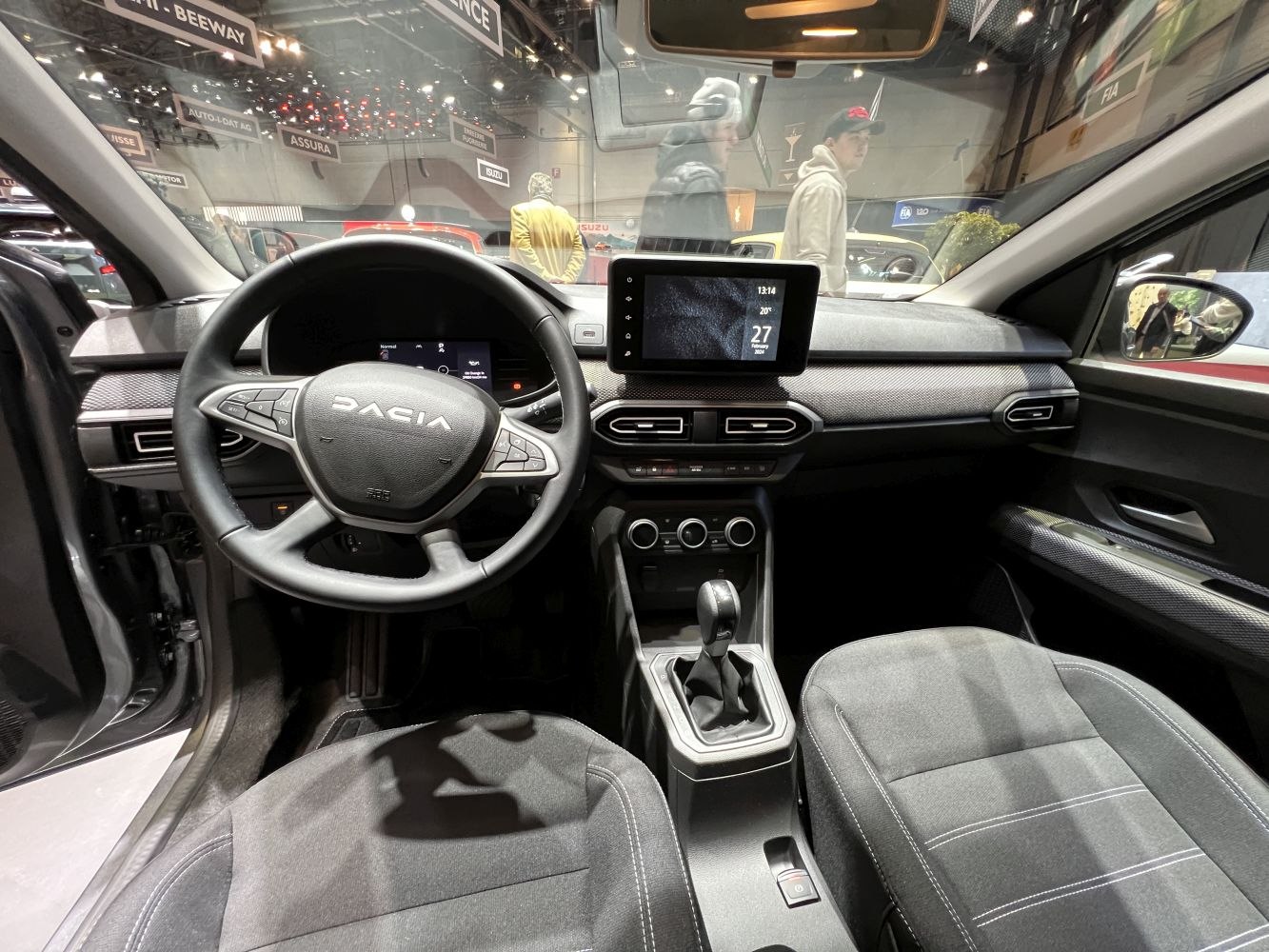 Interior dashboard with multifunctional steering wheel and center touchscreen display