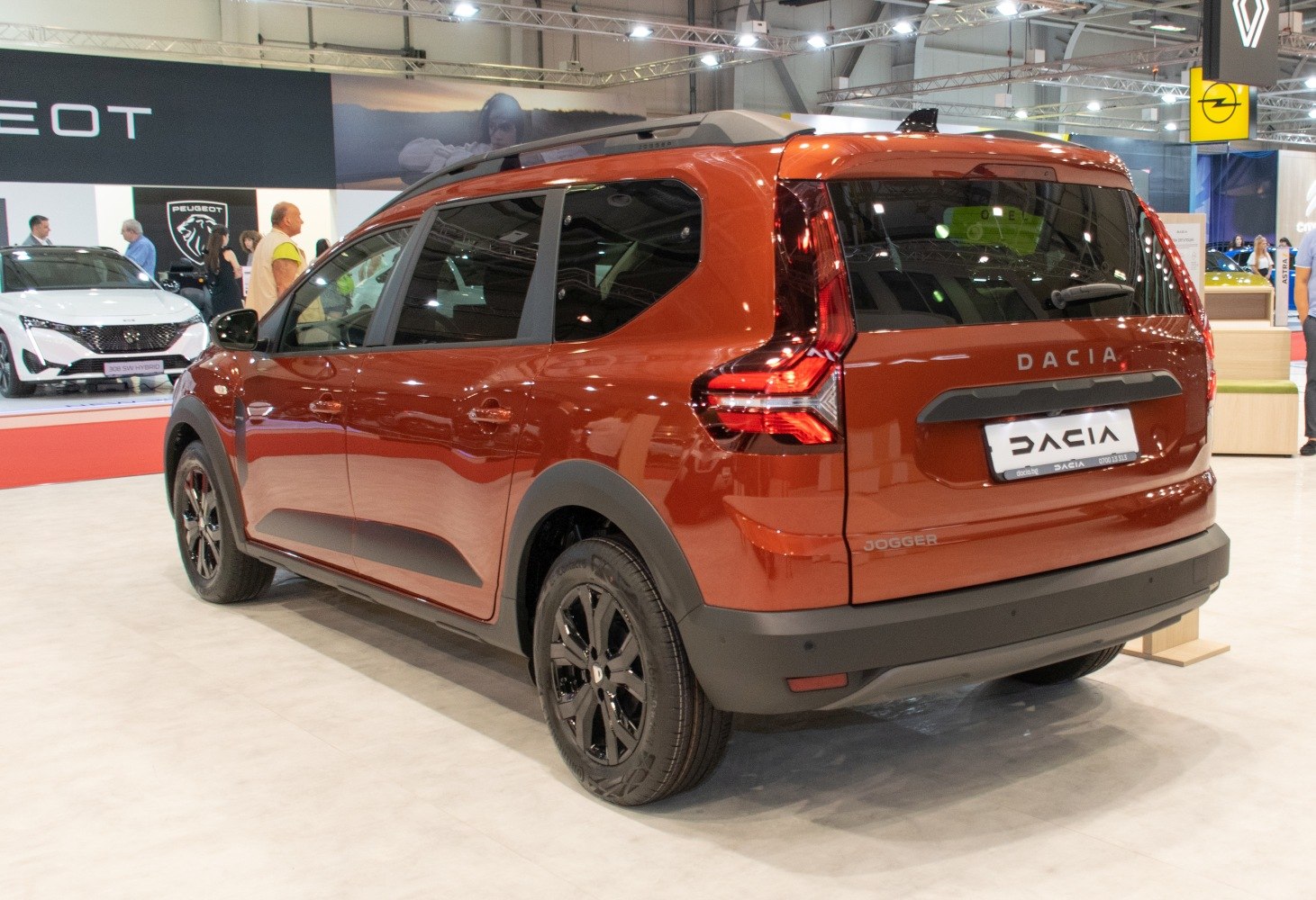 Rear and side view of a vehicle with distinctive angular tail lights and black alloy wheels