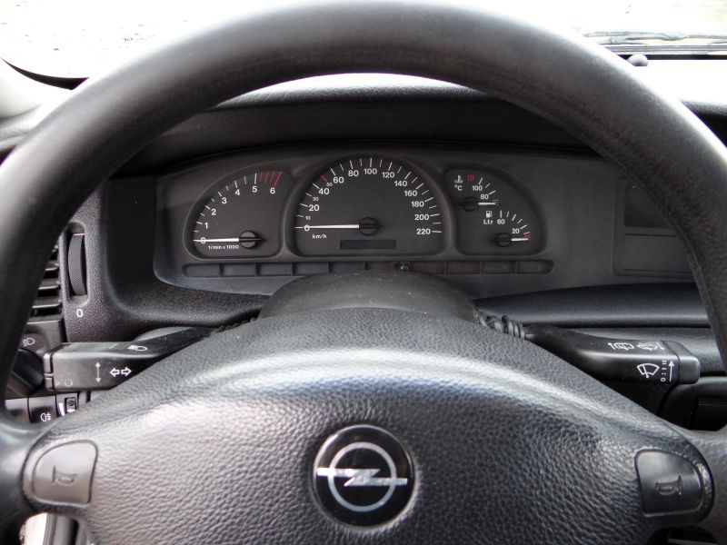 Instrument cluster and steering wheel with Opel logo