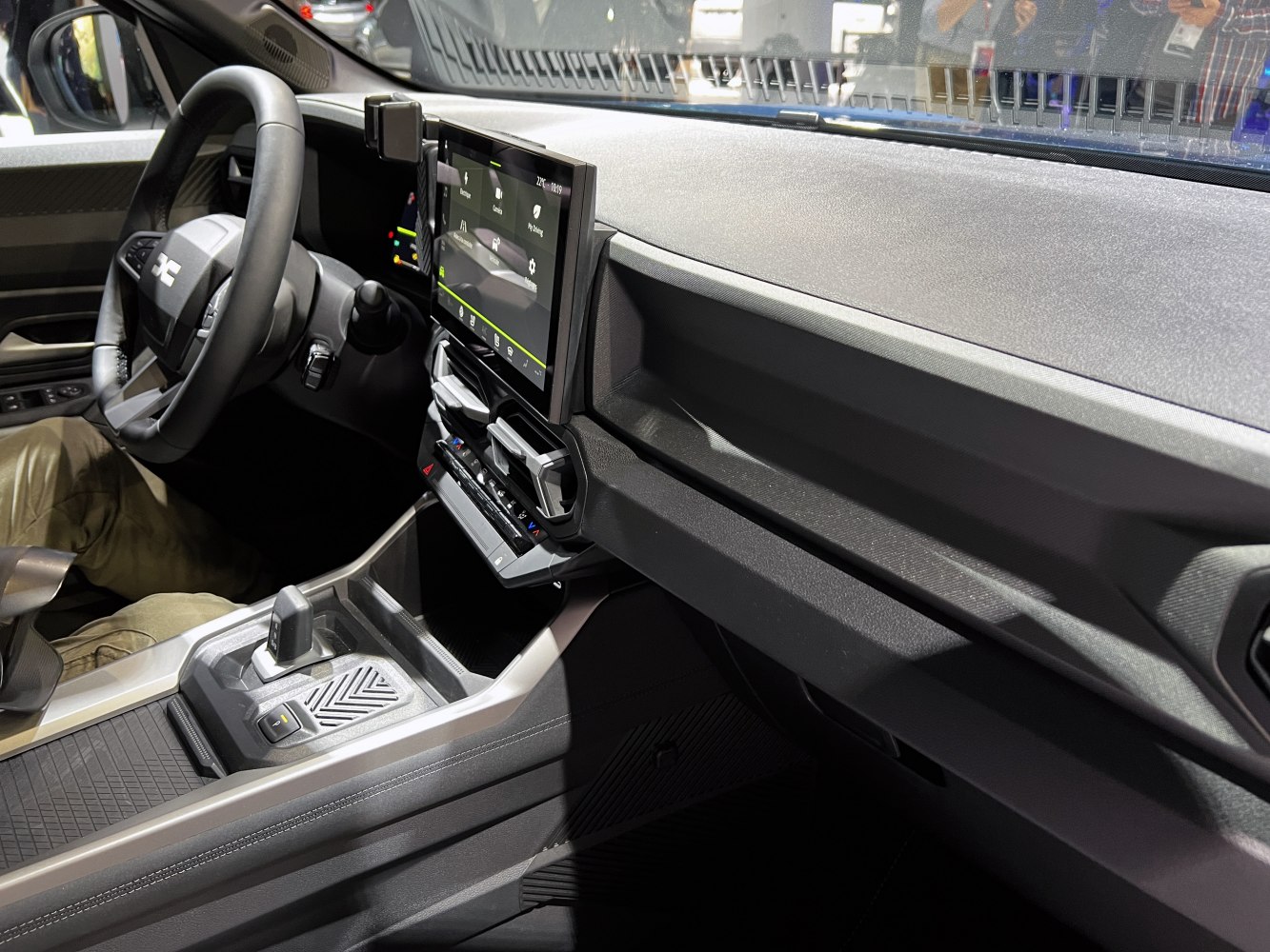 Dashboard with digital cluster, large infotainment screen, ergonomic center console