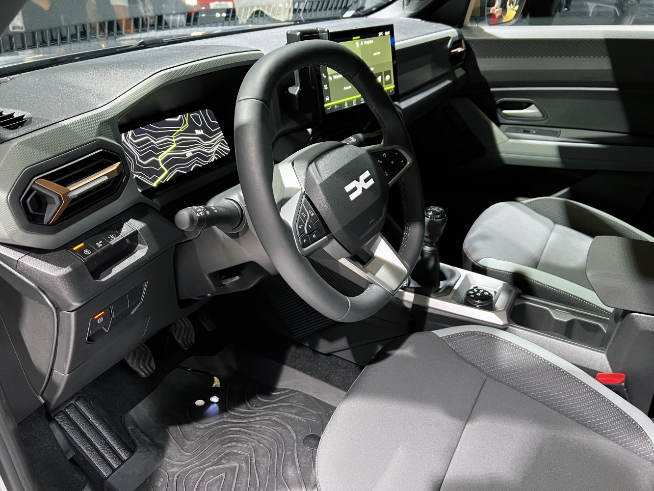 Digital dashboard and multifunction steering wheel in car interior