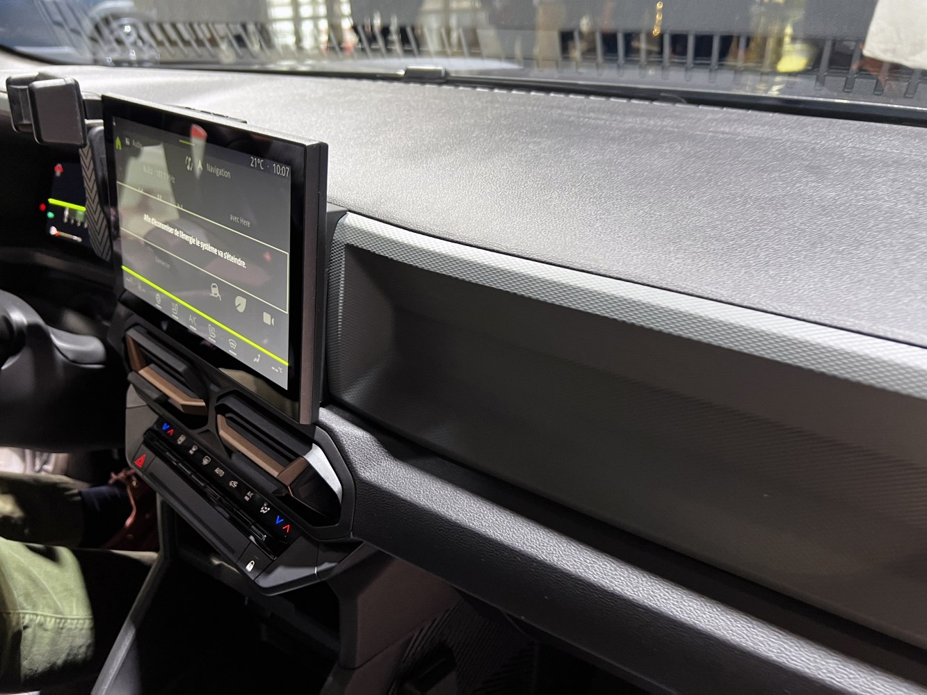 Dashboard with infotainment screen and air vents in a modern vehicle interior