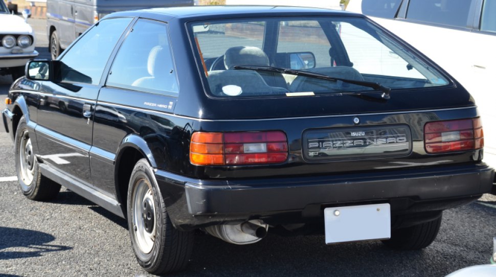 Black 1980s hatchback rear with taillights and rear wiper