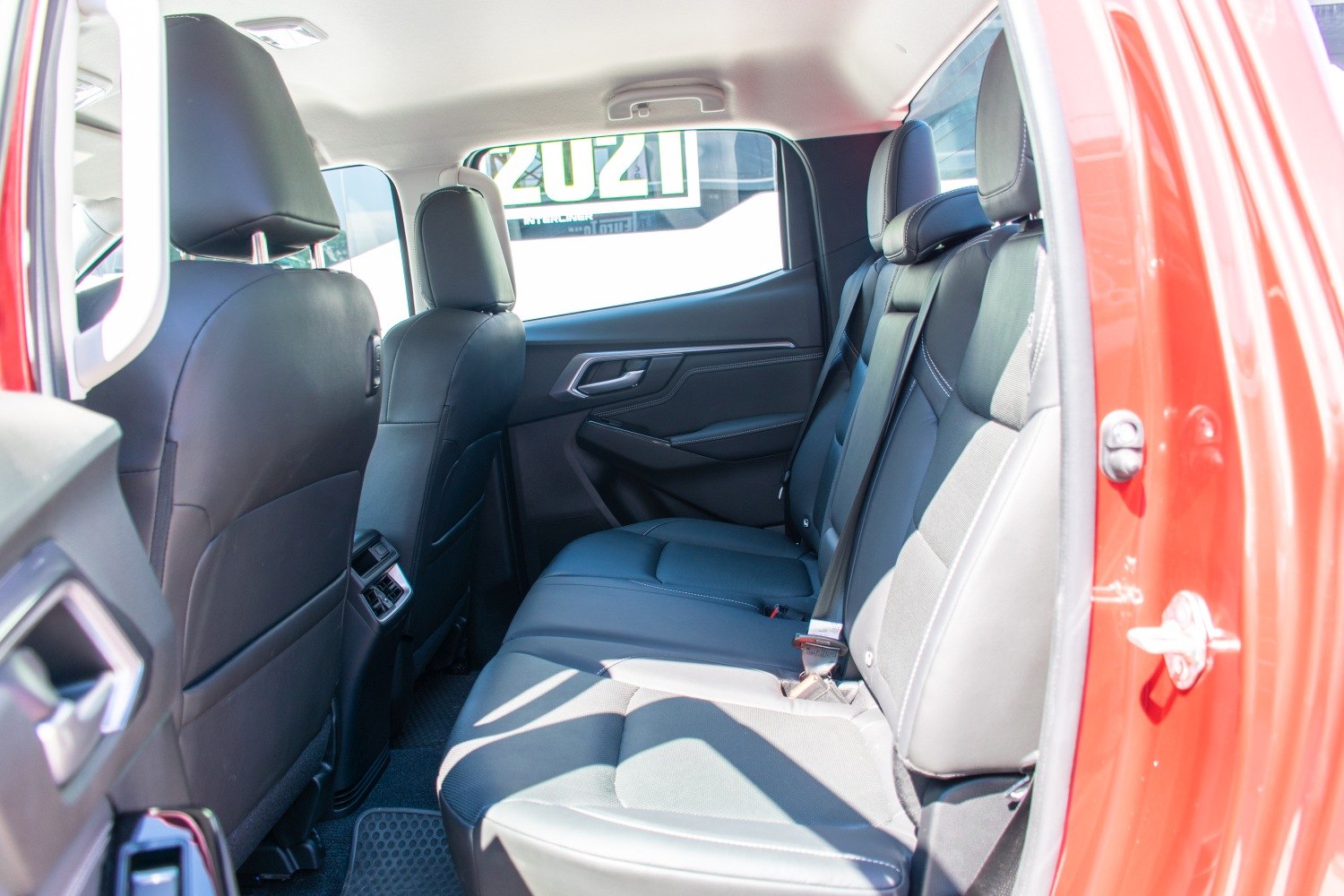 Spacious rear leather seating in a double cab vehicle