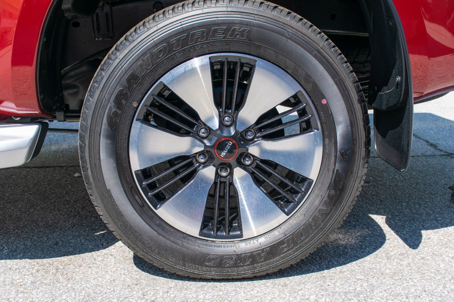 Close-up of alloy wheel and Dunlop Grandtrek tire