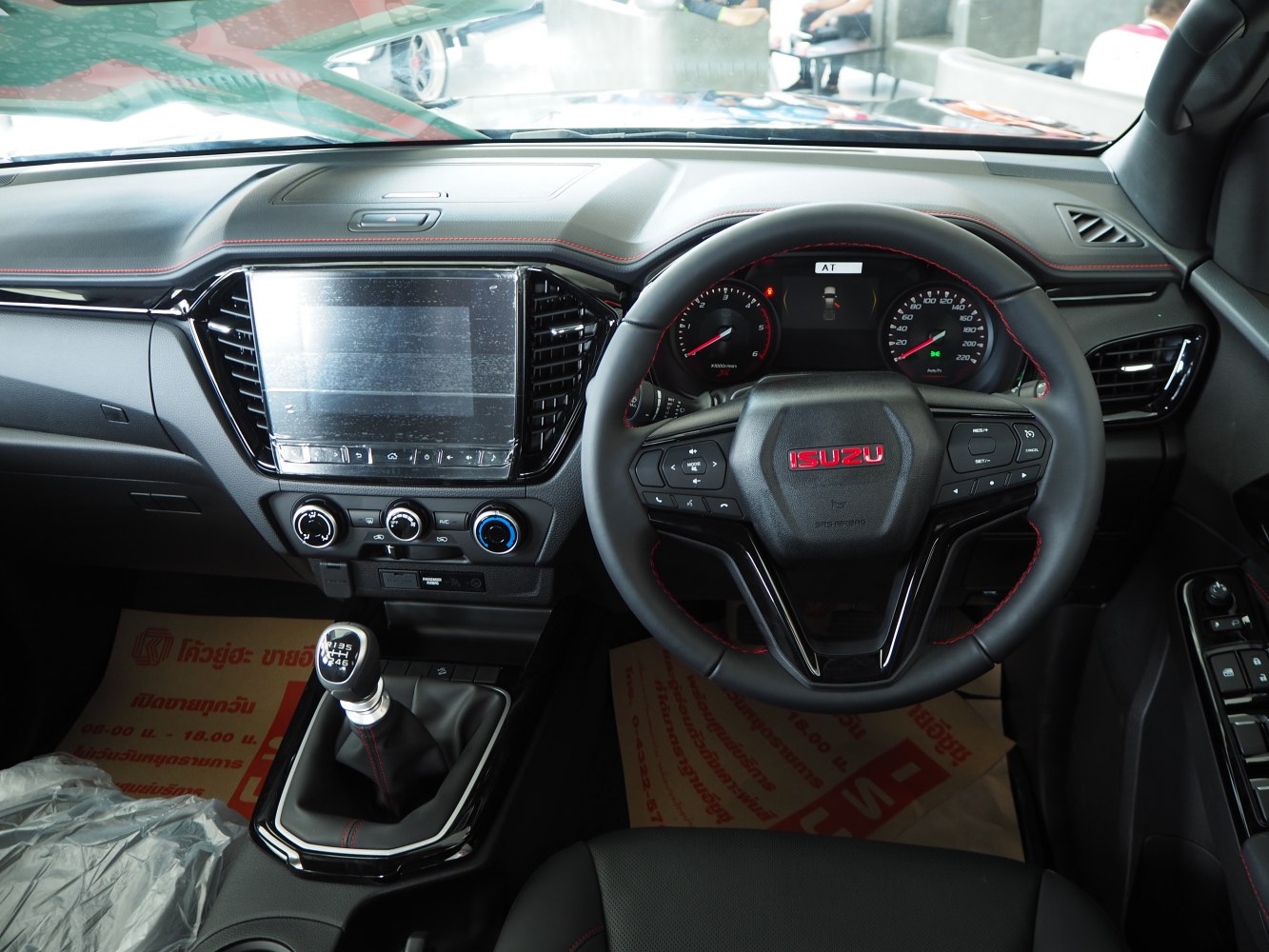 Modern car interior with manual transmission gearshift and dashboard