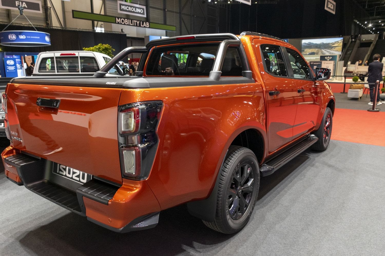 Rear and side profile of pickup truck with bed protector and alloy wheels