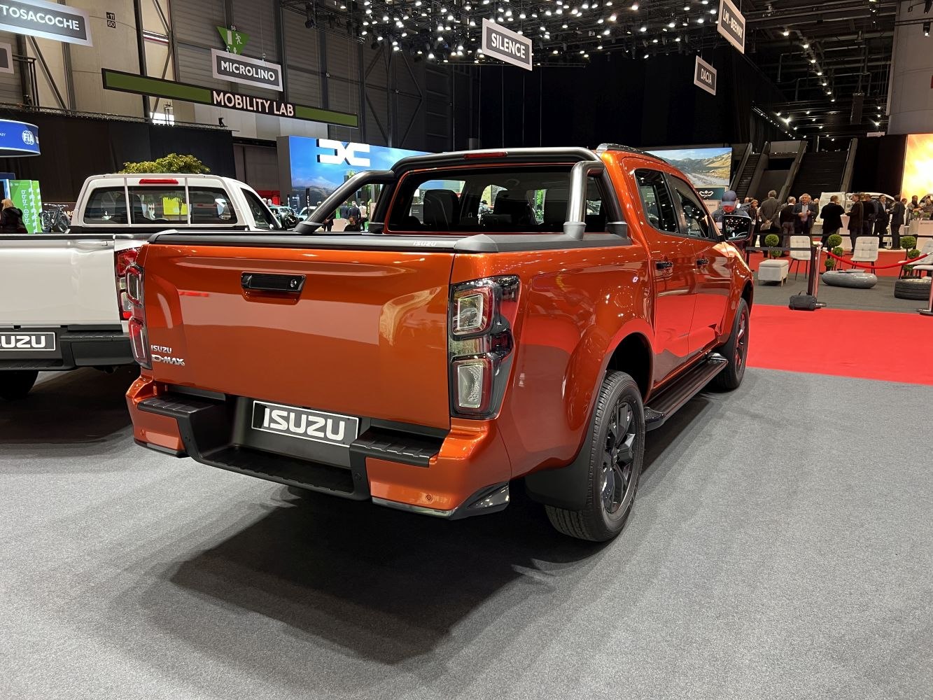 Rear and side view of modern pickup truck double cab with tail lights and truck bed